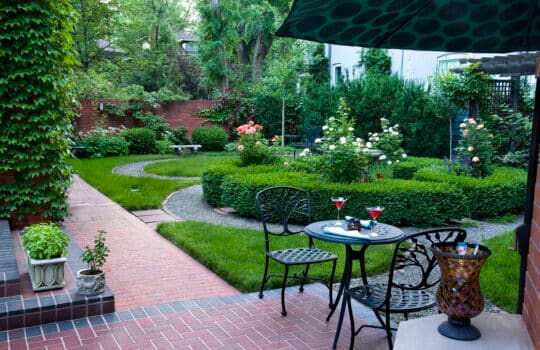 Gardens getting attention: A lush “knot” garden in Denver flowers this spring.
