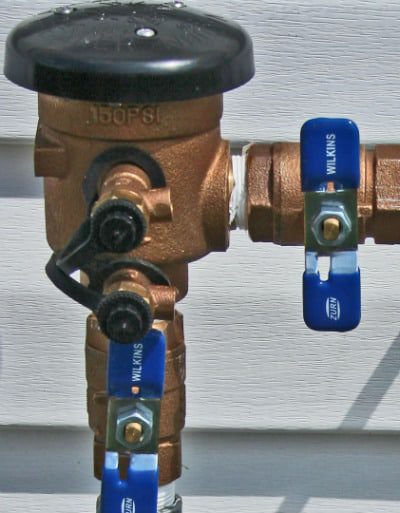 Protect backflow device from an early freeze