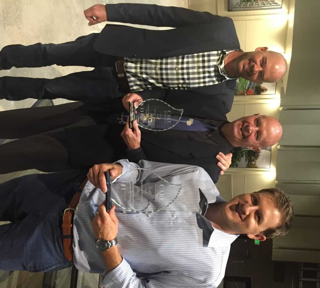 Dan DeGrush right and John Buchanan with Colorado Design Consortium won a CARE Award from HBA for Landscape Remodel.