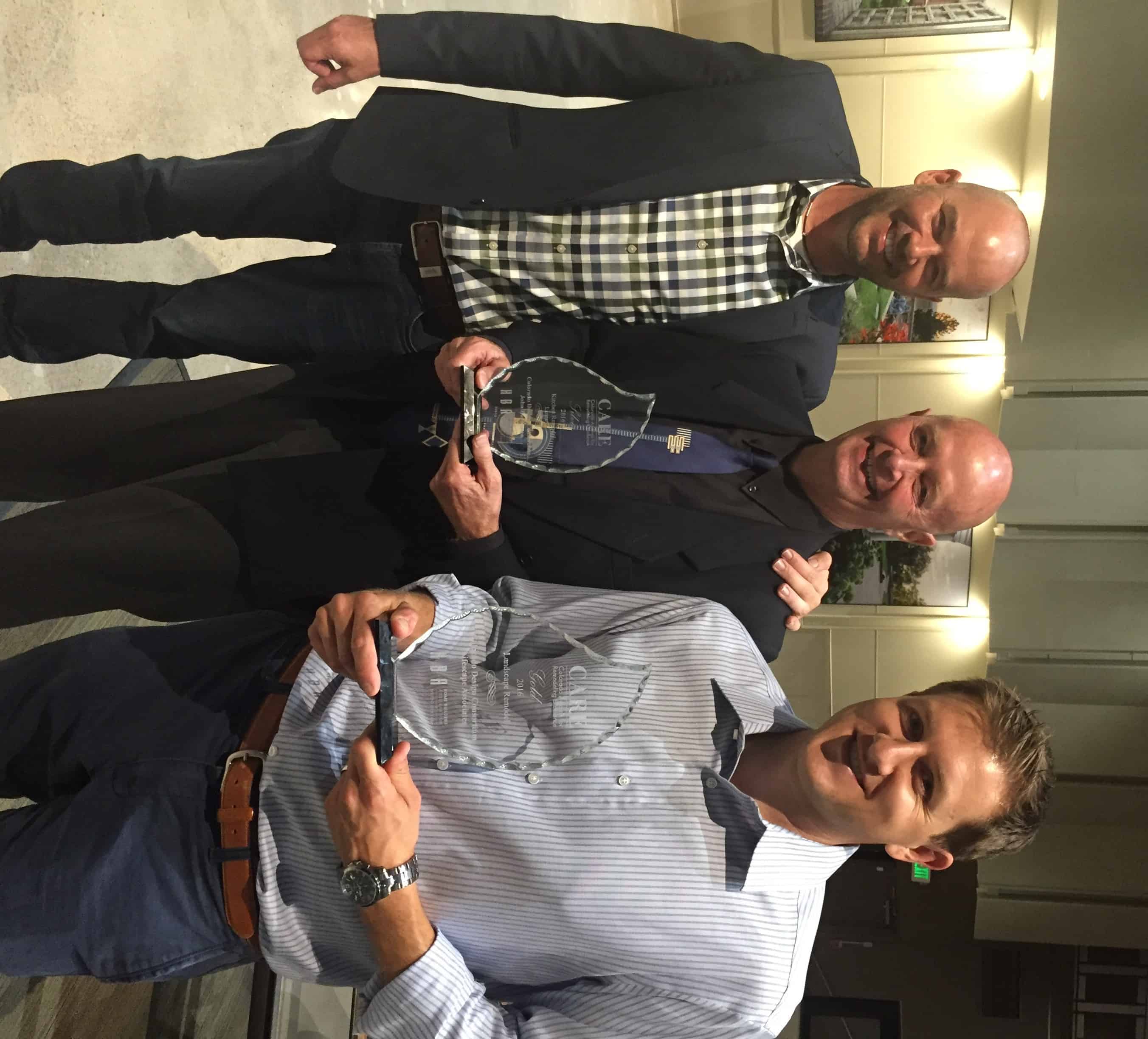 Dan DeGrush right and John Buchanan with Colorado Design Consortium won a CARE Award from HBA for Landscape Remodel.