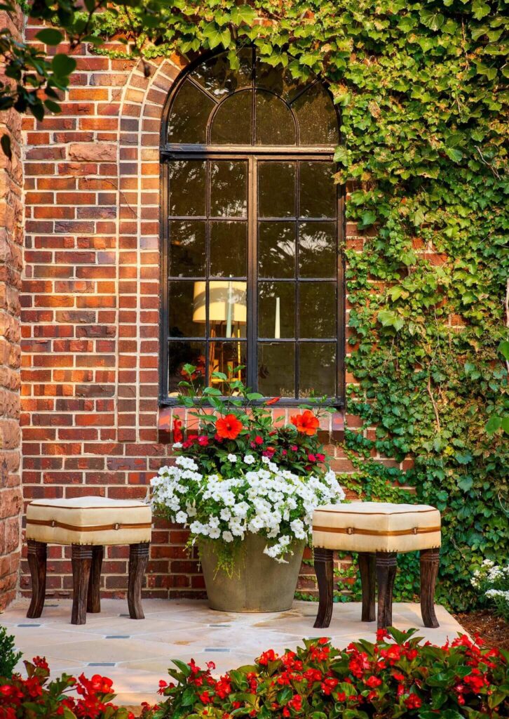 architectural urn and statue detailing traditional garden