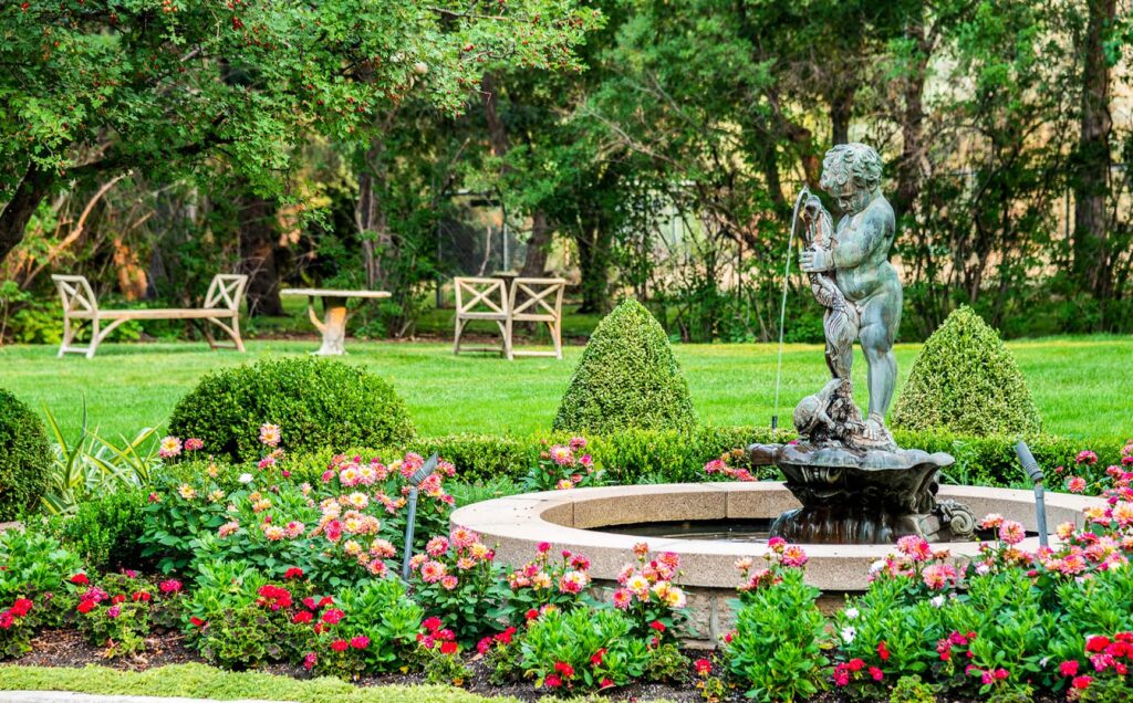 cozy outdoor seating area with flower borders design