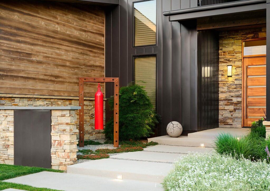 custom built retaining wall stair detail hillside landscape