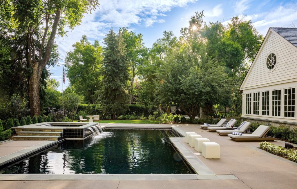 tailored planting design mature trees chic backyard oasis